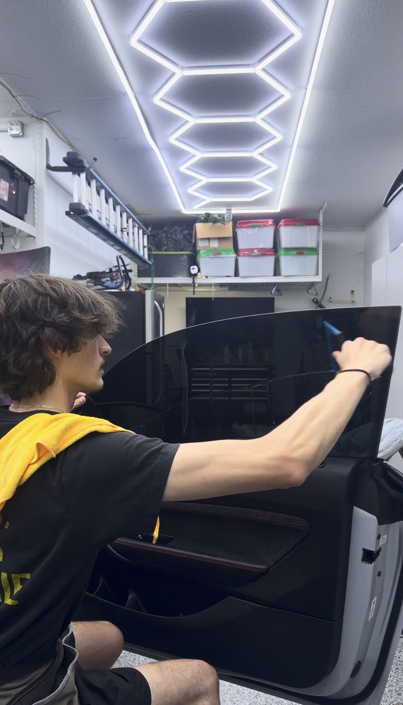 Landyn installing window tint